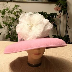 Elegant Pink Feathered Hat With White Floral Accent
